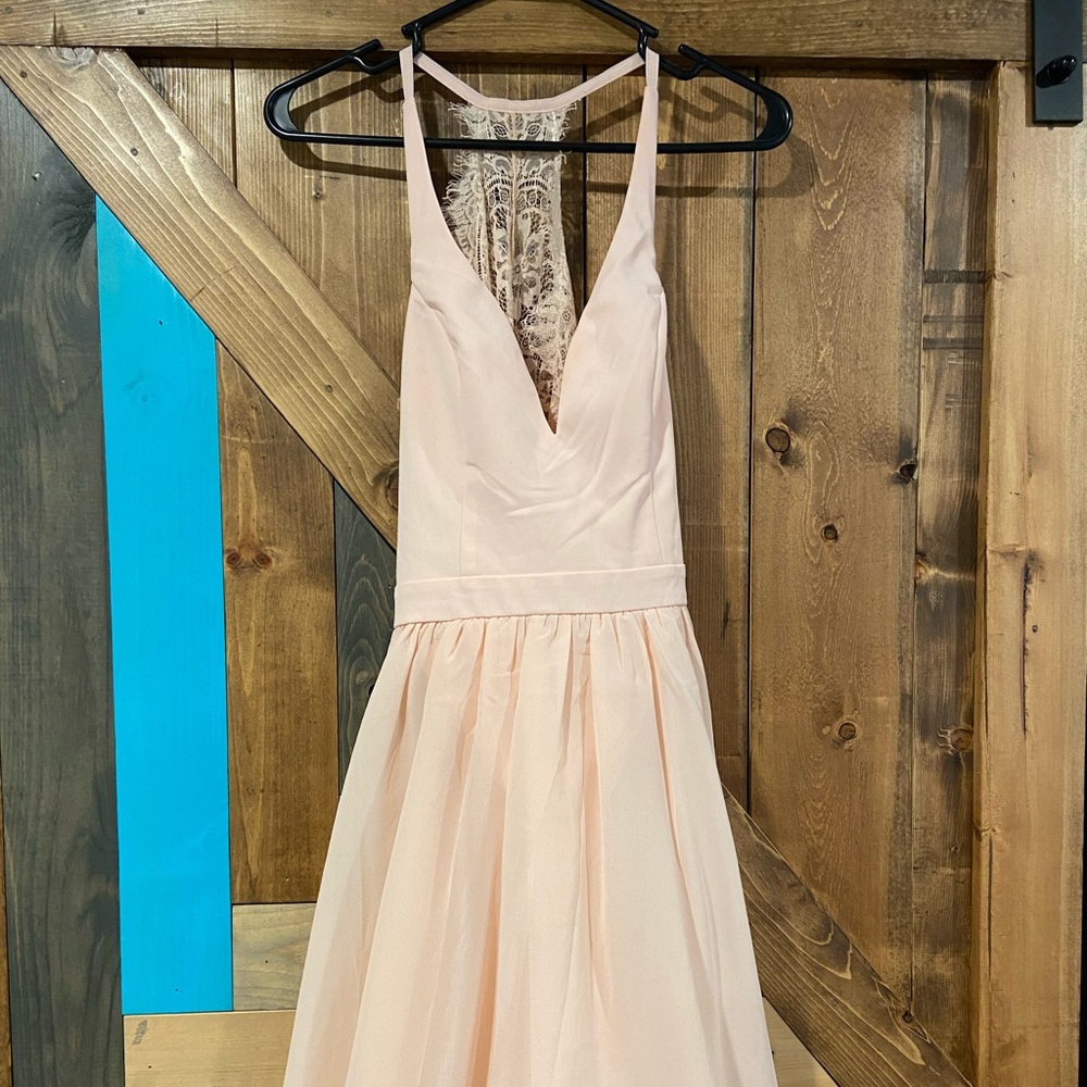 Pink, lace back, short dress.